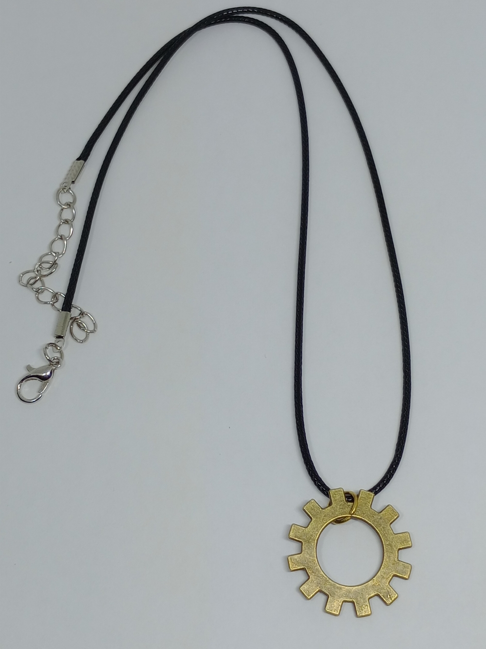 Gold Gear Pendant Necklace on Black Cord